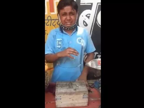 At one side cops giving cake to birthday girl and on another side beating a 12-year-old boy