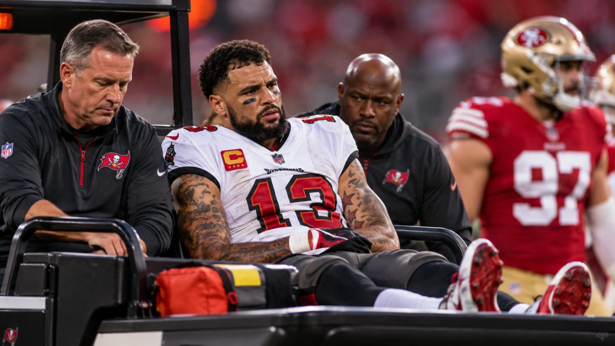 Mike Evans Carted Off With Rib Injury as 49ers' Growing Casualty List Deepens Alarm